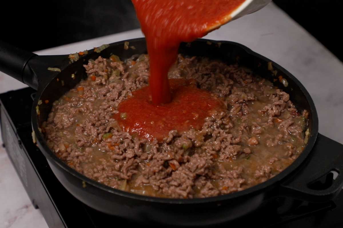 paso a paso macarrones con bechamel tomate
